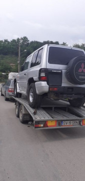 Transport auto trailer Suceava, tractari, transport utilaje platforma